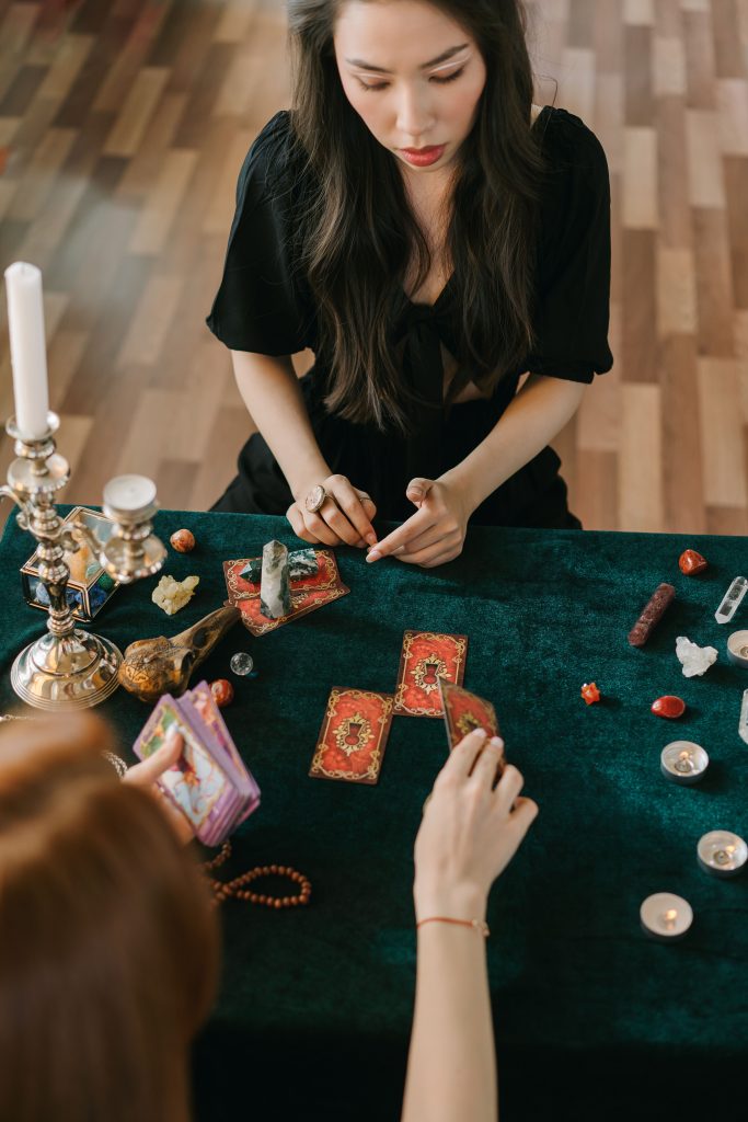women discussing psychic reading